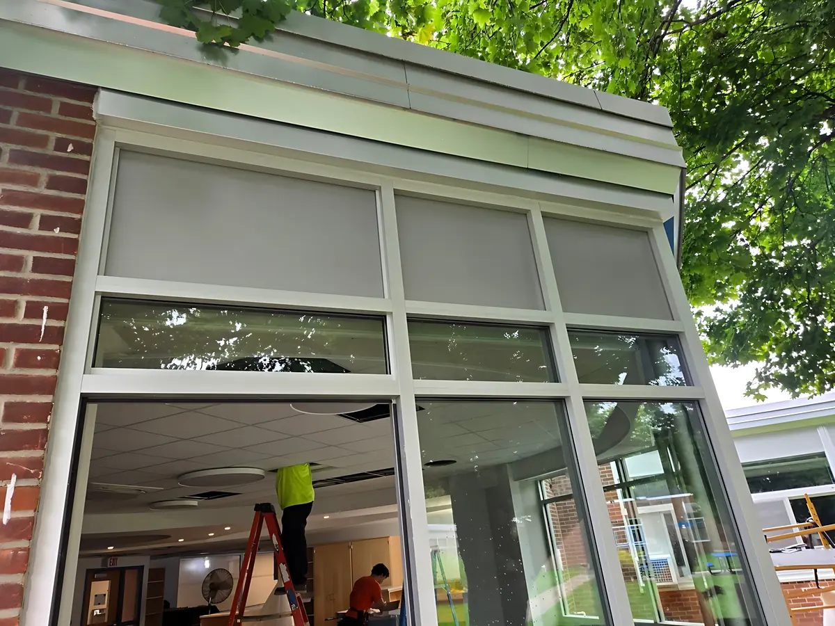 Finished aluminum entrance with glass transoms